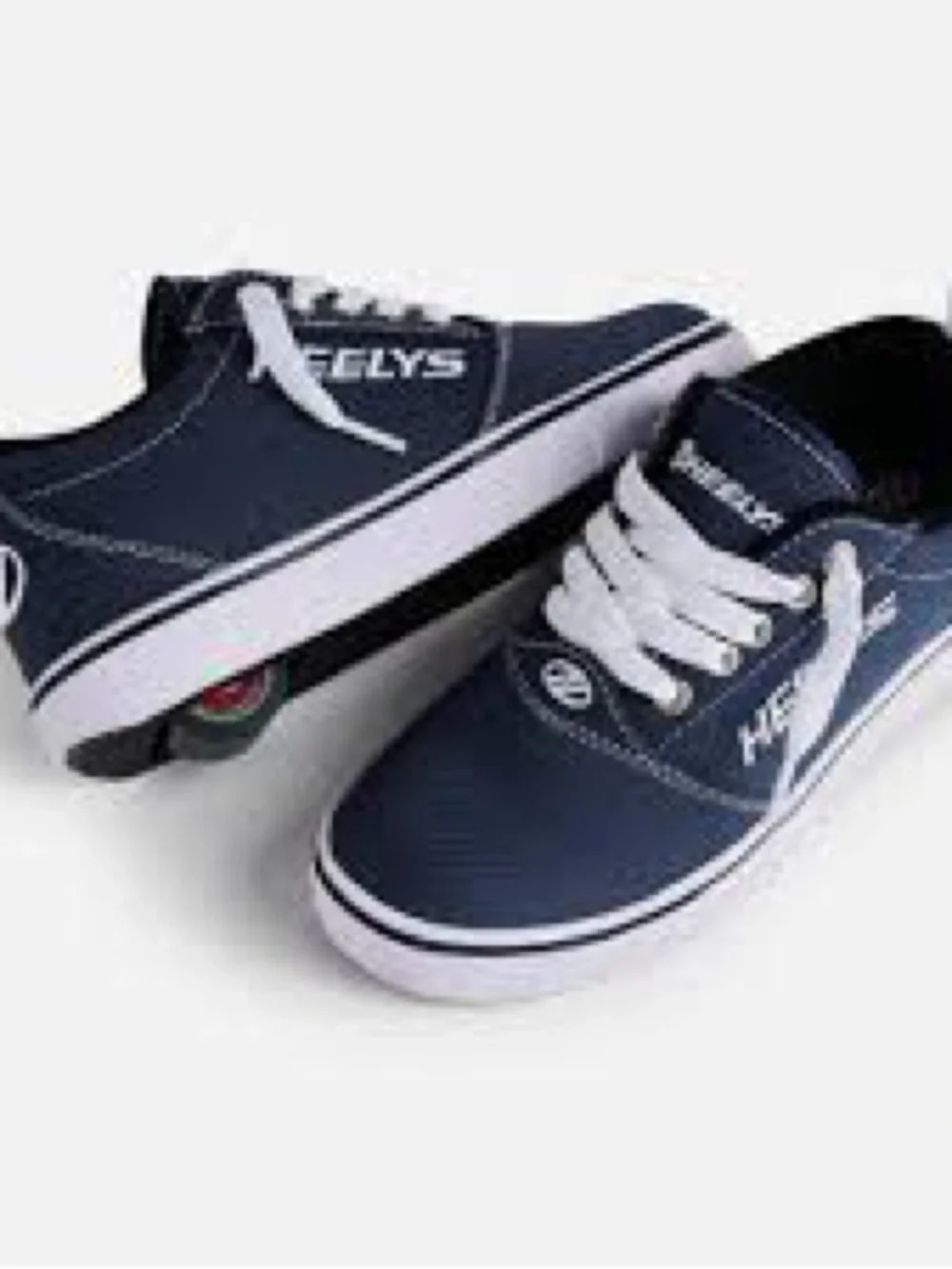 Heelys Pro 20 skate shoes in navy canvas with white laces